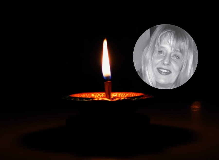 slika svijeće u mraku i izrezana slika lica preminule nastavnice